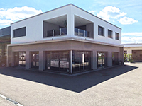 Wohn- und Geschäftshaus Romont  TissoT Immobilien