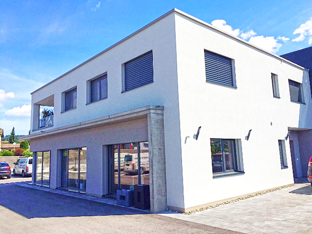Romont  TissoT Immobilier : Immeuble commercial et résidentiel 4.5 pièces